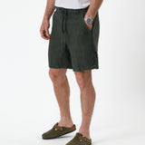 The Holiday Linen Short in dark khaki — side-front view with drawstring waist
