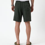 The Holiday Linen Short in dark khaki — back view showing the rear pocket and waistband