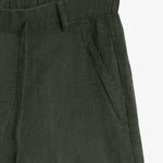 The Holiday Linen Short in dark khaki — close-up of the tonal C'est normal pocket embroidery
