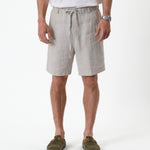 The Holiday Linen Short in natural — front view featuring a drawstring waist