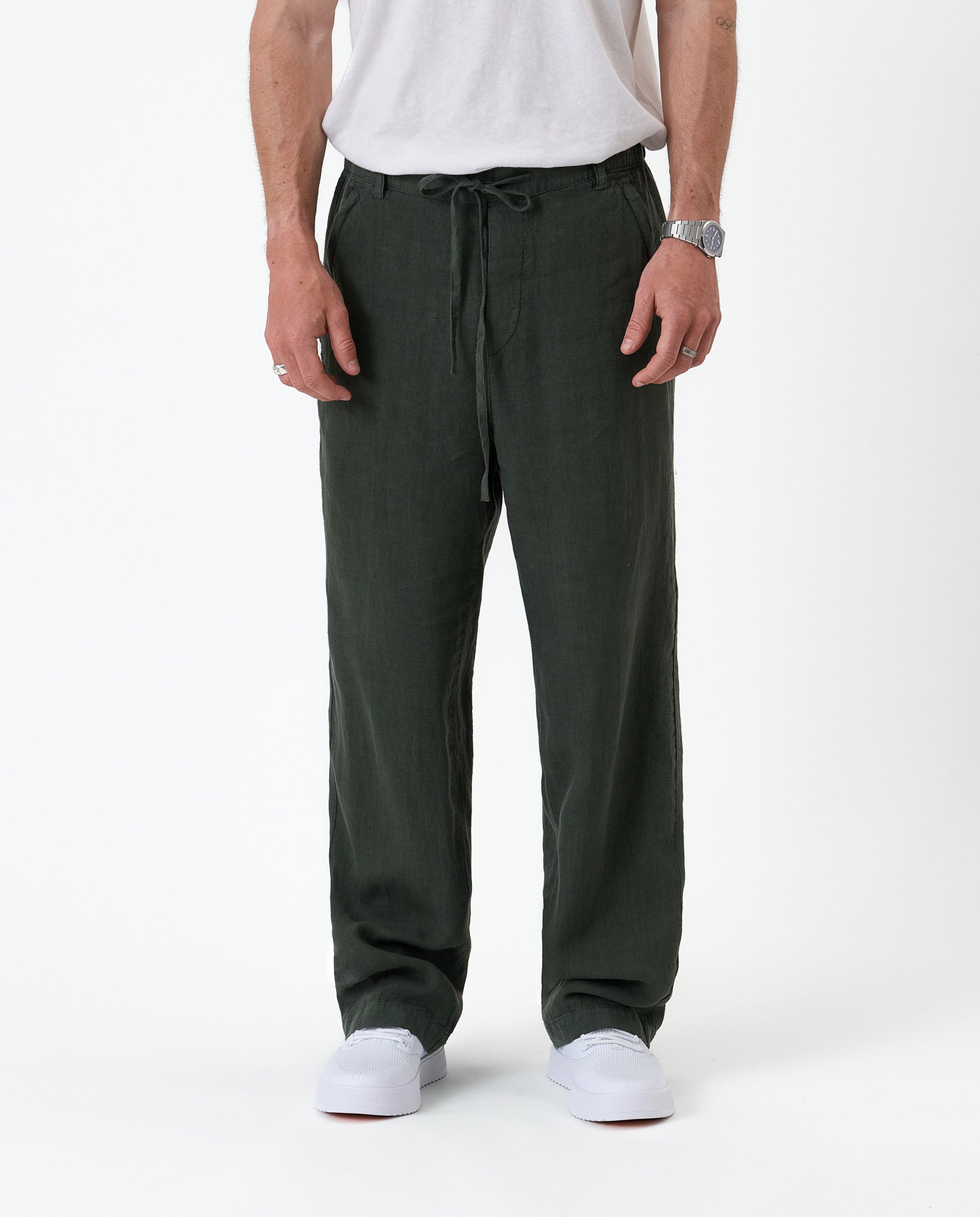 The Holiday Linen Trouser in dark khaki — front view with a drawstring waist