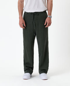 The Holiday Linen Trouser in dark khaki — front view with a drawstring waist