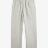 The Holiday Linen Trouser in natural — back view with elasticated waistband and pocket