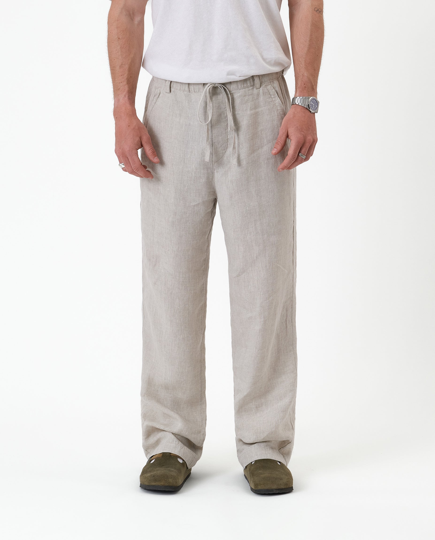 The Holiday Linen Trouser in natural — front view showing the drawstring waist