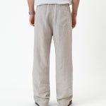 The Holiday Linen Trouser in natural — back view against a white background