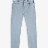 A front view of The Jeans Skinny Fit in Light Blue, laid flat on a white background. The image highlights the classic denim look with a custom shoelace belt and subtle orange accent stitching from c'est normal.