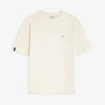 The Oversized Printed T-shirt in cream — laid flat with a small black logo on the chest