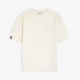 The Oversized Printed T-shirt in cream — laid flat with a small black logo on the chest