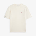 The Oversized Printed T-shirt in cream and red — front view with a small red chest logo