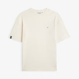 The Oversized Printed T-shirt in cream and red — front view with a small red chest logo
