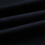 The Proper Pant Relaxed Straight Fit in navy — close-up of the fabric texture.