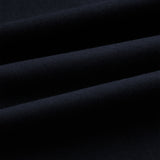 The Proper Pant Relaxed Straight Fit in navy — close-up of the fabric texture.