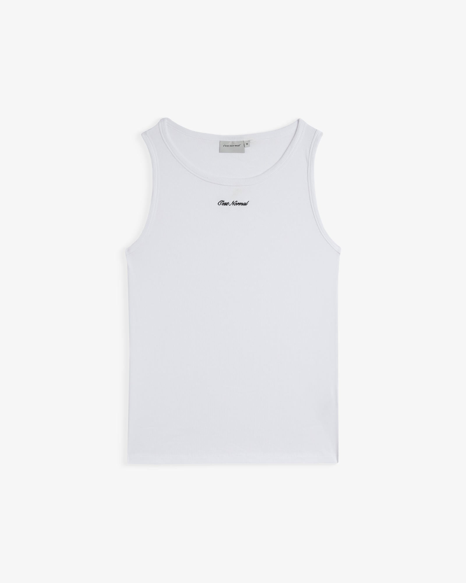 The Ribbed Tank Top in white — front view with the C'est normal script logo