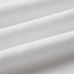 The Sanremo Linen Tee in white — close-up showing the textured jersey fabric