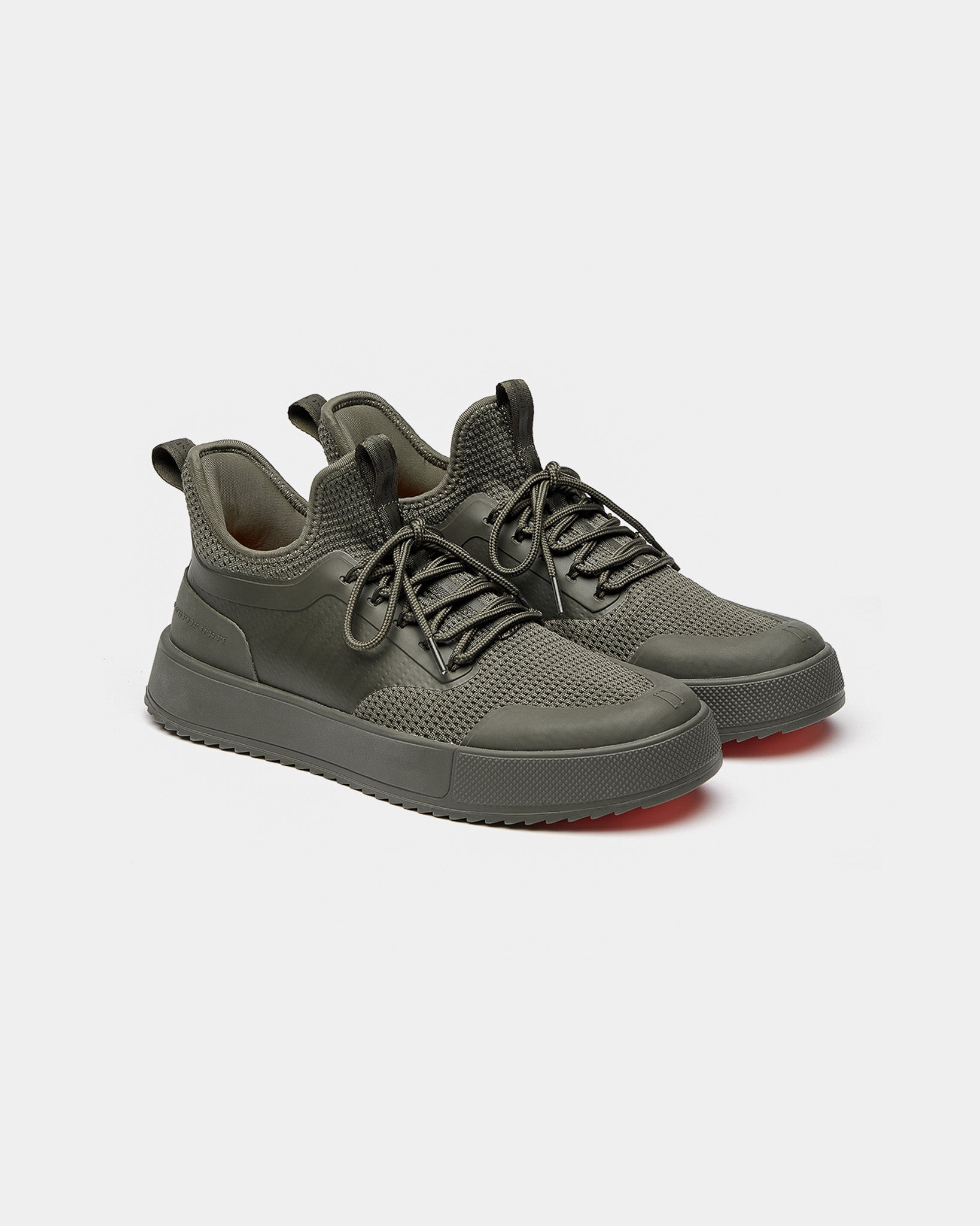 The Sneakers 2.0 in khaki — side view showing the mesh upper and rubber accents