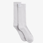 The Socks 3-pack in grey — ribbed texture with a white C'est normal logo tag.