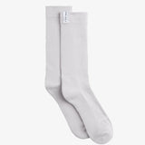 The Socks 3-pack in grey — ribbed texture with a white C'est normal logo tag.