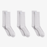 The Socks 3-pack in grey — three pairs of mid-calf socks showing ribbed cuffs and logo tags