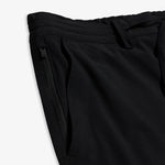 The Board Shorts in black — detail view of the zippered side pocket