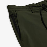 The Board Shorts in khaki — close-up of the zippered pocket and drawstring