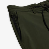 The Board Shorts in khaki — close-up of the zippered pocket and drawstring