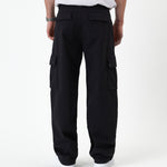 The Monterey Cargo Pant in black — back view showing the cargo pockets and relaxed fit