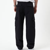 The Monterey Cargo Pant in black — back view showing the cargo pockets and relaxed fit