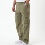 The Monterey Cargo Pant in Light Khaki — side view showing the cargo pocket and white sneakers