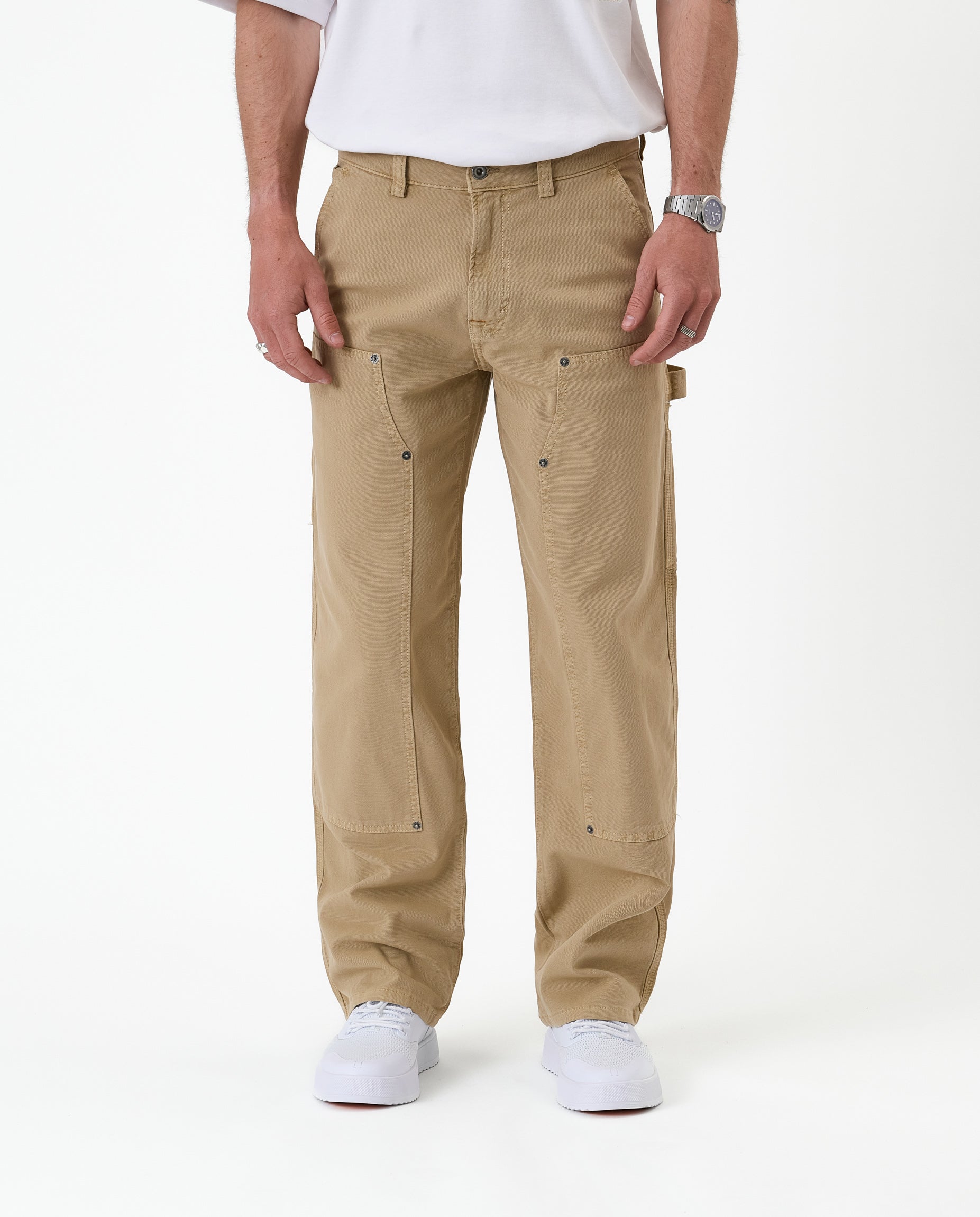 The Carpenter Pant in beige — front view showing the straight leg silhouette