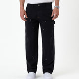 The Carpenter Pant in black — front view showing the double knee panels and rivets