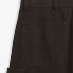 The Carpenter Pants in brown — close-up of the back pocket and hammer loop