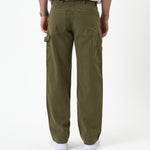 The Carpenter Pant in olive green — back view showing utility pockets and a hammer loop
