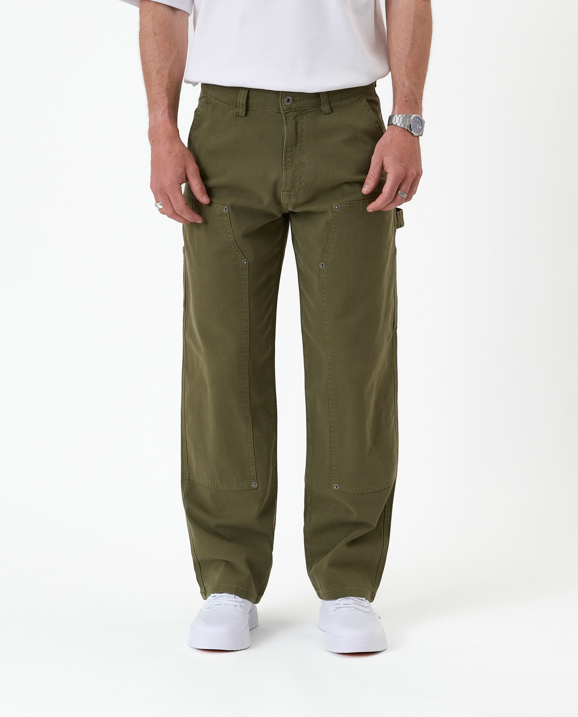 The Carpenter Pant in olive green — front view showing the straight leg silhouette