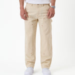 The Carpenter Pant in sand — front view showing the straight leg silhouette