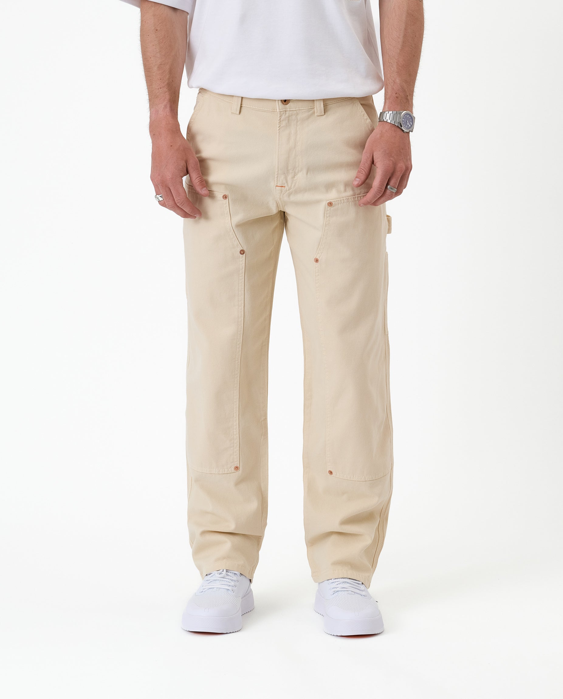 The Carpenter Pant in sand — front view showing the straight leg silhouette