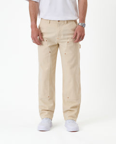 The Carpenter Pant in sand — front view showing the straight leg silhouette