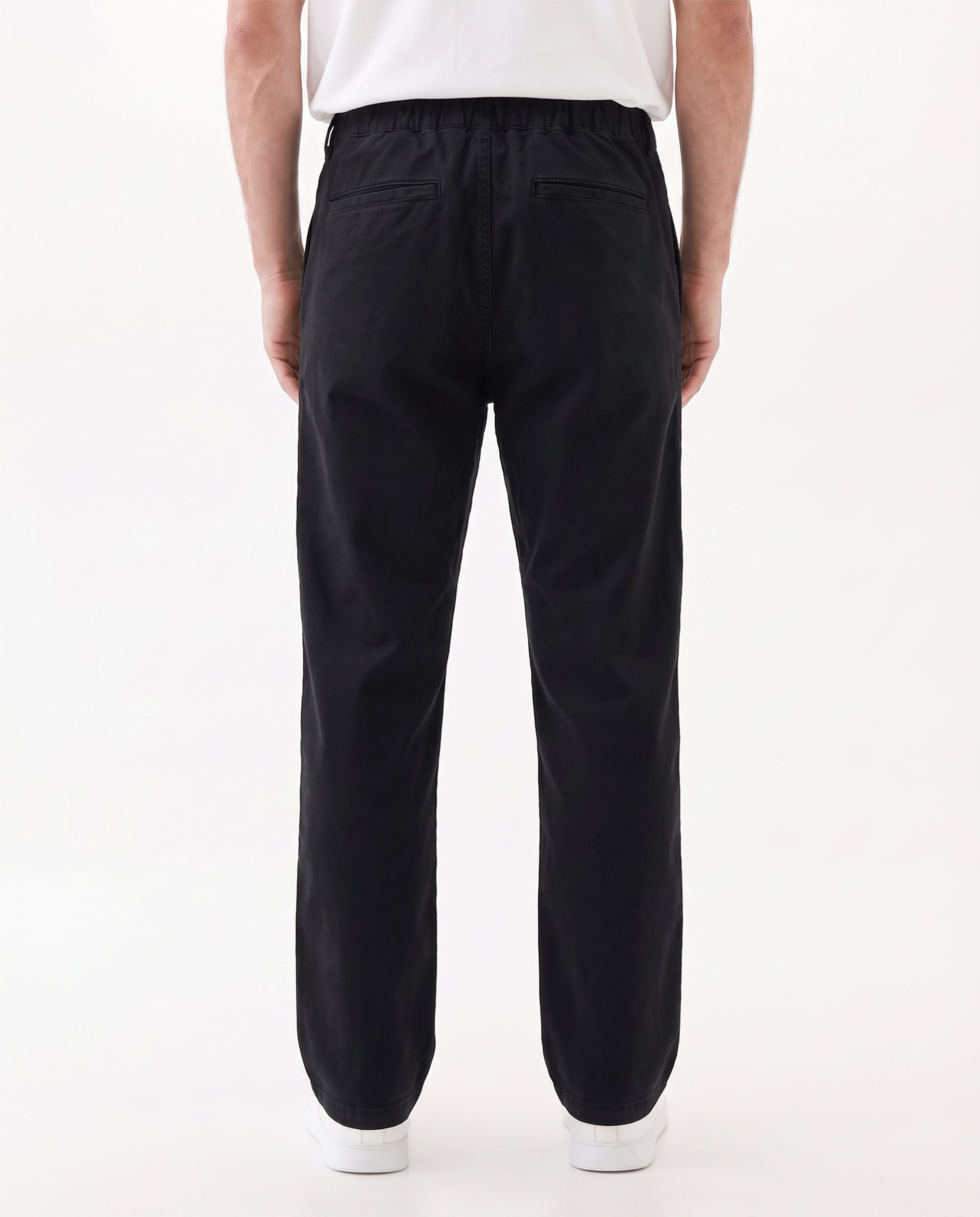 The Chamonix Chino in black — back view showing the relaxed fit