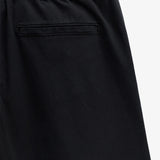 The Chamonix Chino in black — close-up of the back pocket and waistband