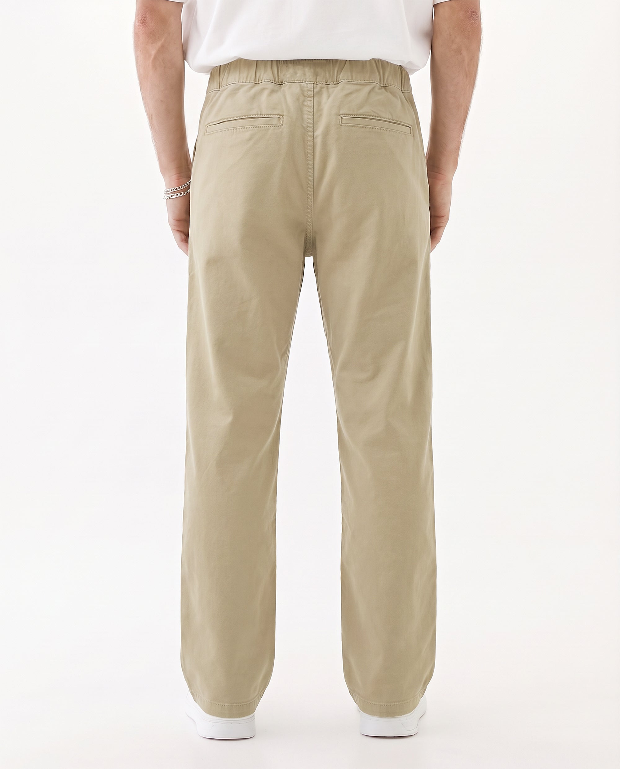 The Chamonix Chino in khaki beige — back view showing the rear pockets
