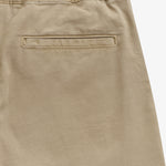 The Chamonix Chino in khaki — close-up of the back welt pocket and elastic waistband