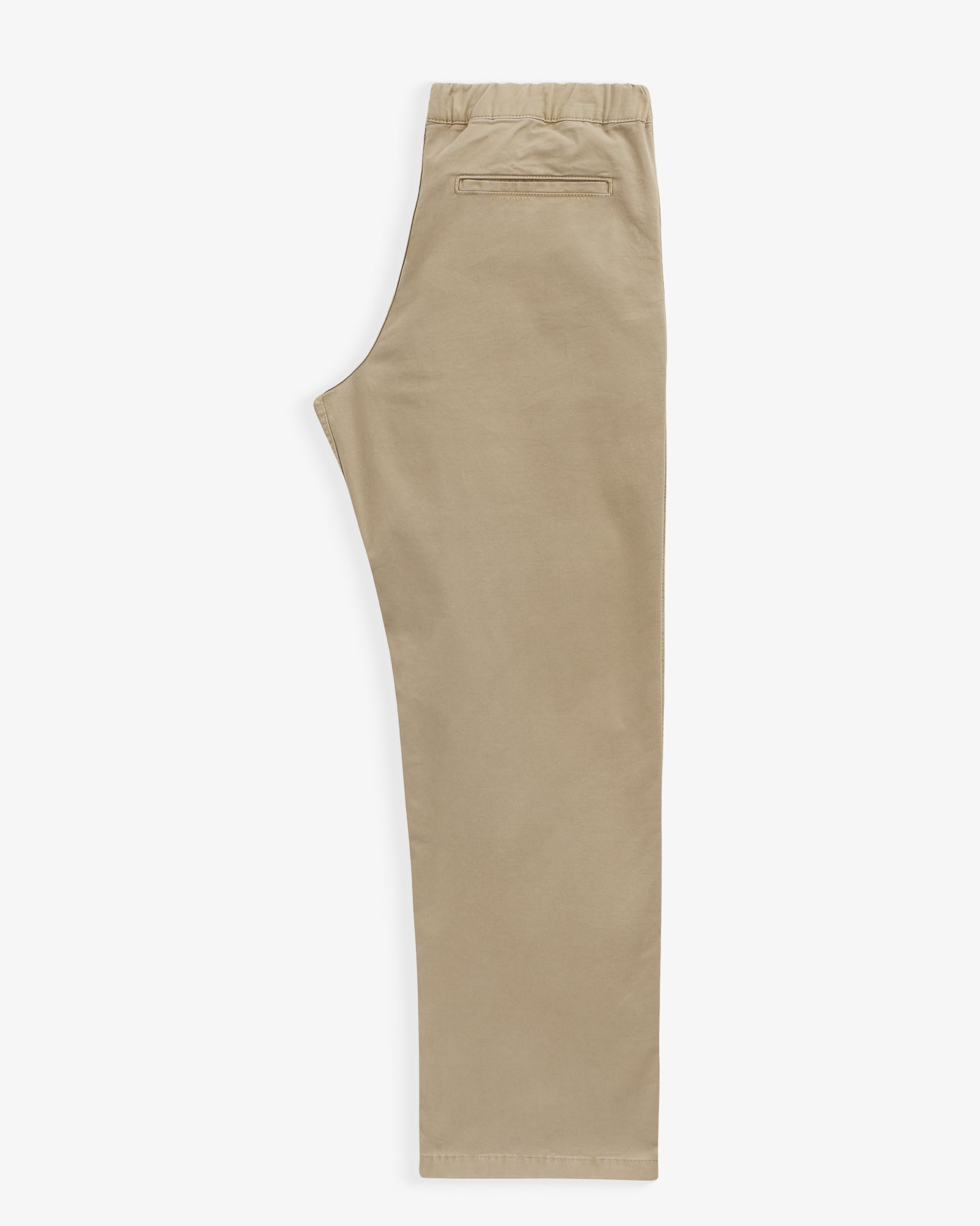 The Chamonix Chino in khaki — folded view showing the waistband and back pocket detail
