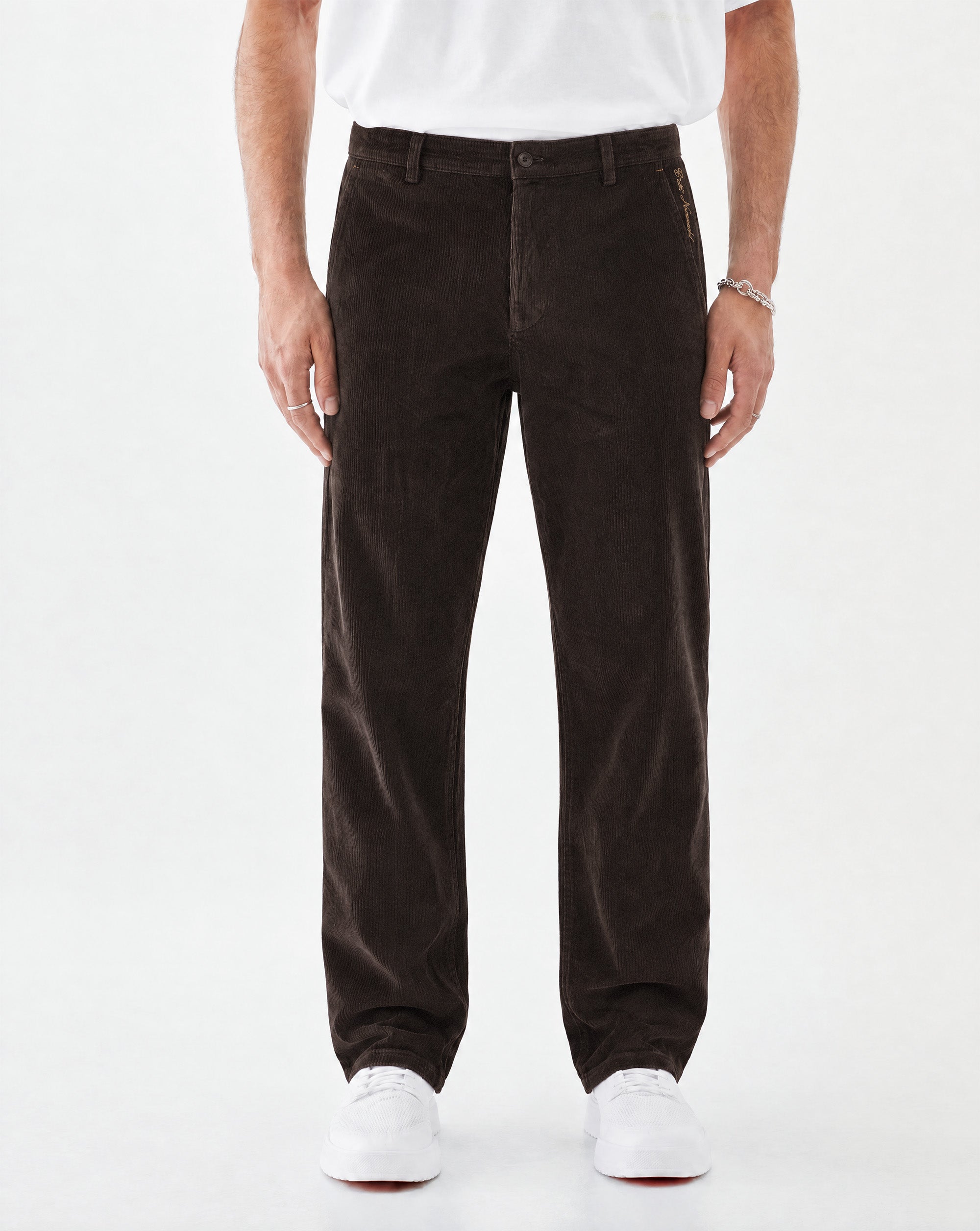 The Daily Cord Chino in chocolate — front view showing straight leg fit