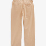 The Daily Cord Chino in Irish cream — back view with buttoned rear pockets