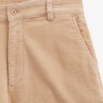 The Daily Cord Chino in Irish cream — close-up of waistband and front pocket
