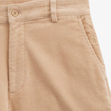 The Daily Cord Chino in Irish cream — close-up of waistband and front pocket