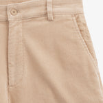 The Daily Cord Chino in irish cream — close-up of the waistband and pocket detail