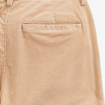 The Daily Cord Chino in Irish cream — close-up of the buttoned rear pocket