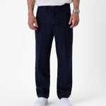 The Daily Linen Trouser in navy — front view showing the straight leg silhouette