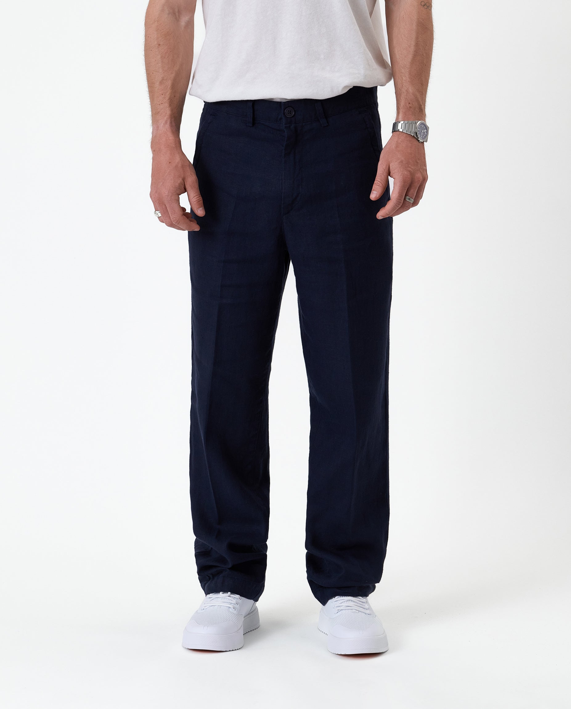 The Daily Linen Trouser in navy — front view showing the straight leg silhouette