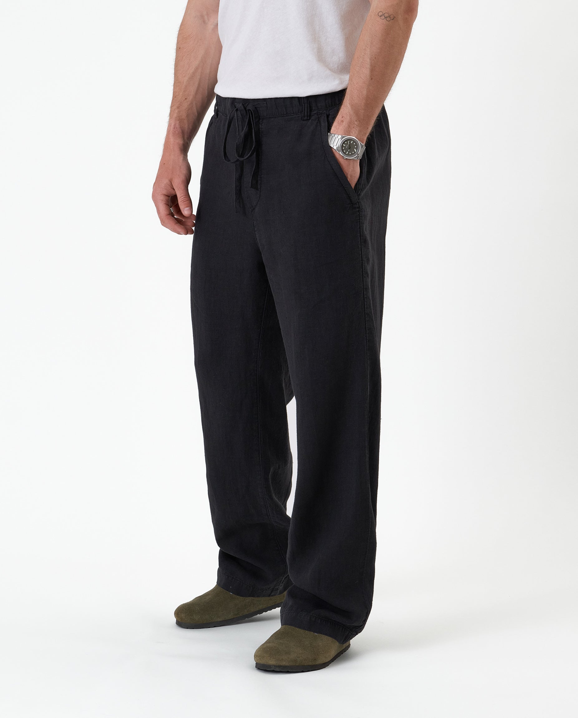 The Holiday Linen Trouser in black — front view against a white background